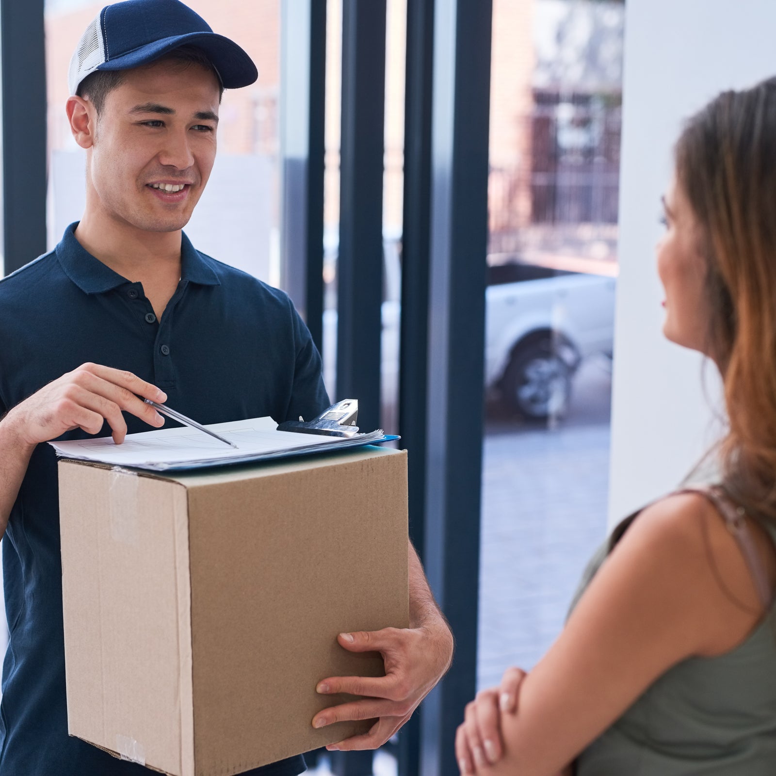 courier making a delivery- City Business Shipping